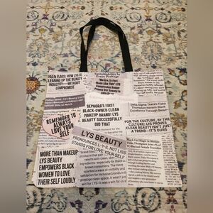 NWOT LYS Beauty Newsprint Tote Bags